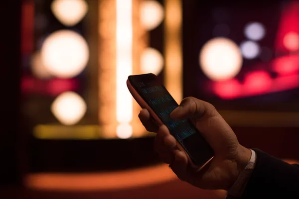 A glowing roulette wheel with cascading chips, symbolizing the engaging live and instant-win games available on 2G777.